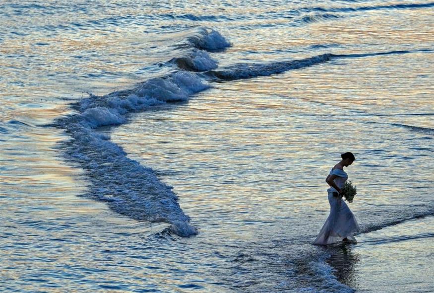 Νύφη στην Κίνα (AP Photo/Andy Wong)