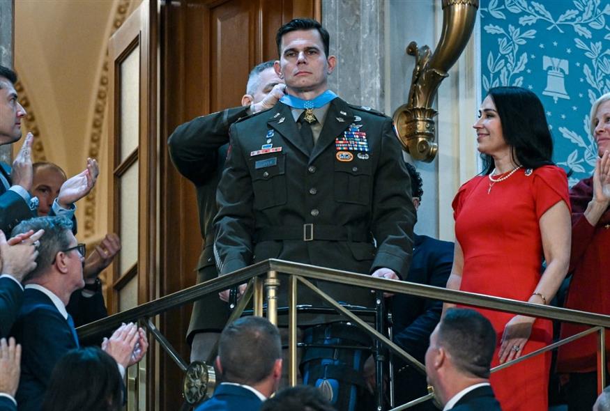 (Kenny Holston/The New York Times via AP, Pool)