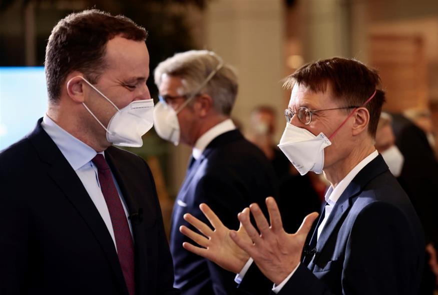 (Hannibal Hanschke/Pool via AP)