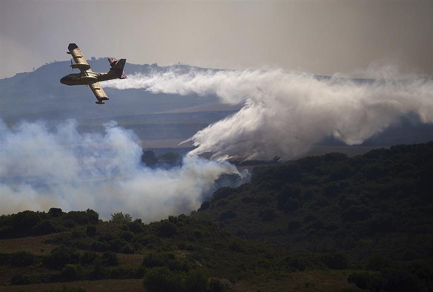 Φωτιά σε δασική έκταση στην Ισπανία τον περασμένο Ιούνιο (Associated Press)