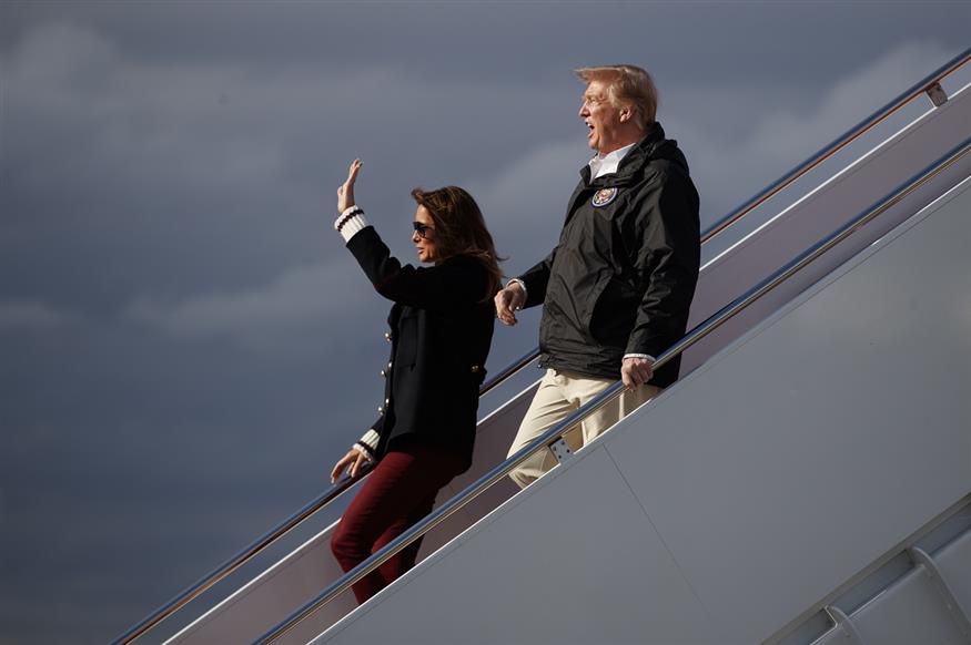 Η Μελάνια και ο Τραμπ. Είναι, άραγε, οι αληθινοί; (AP Photo/Carolyn Kaster)
