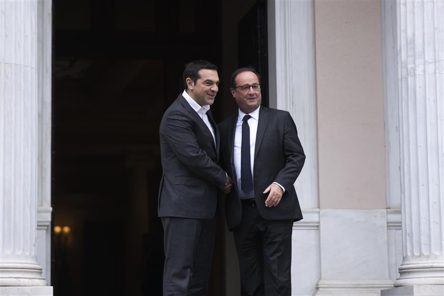 Tsipras-Hollande/(AP Photo/Petros Giannakouris)