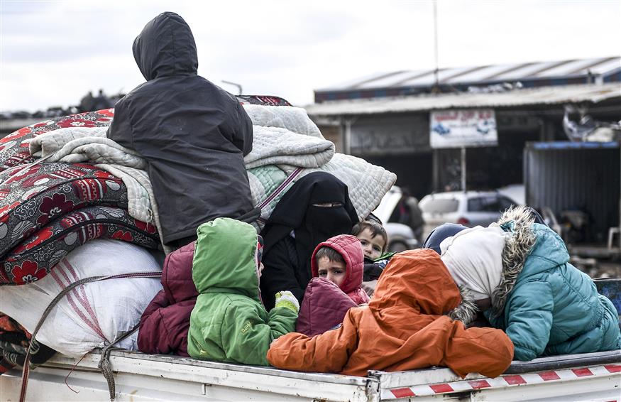 Πρόσφυγες εγκαταλείπουν την Ιντλίμπ/(AP Photo)