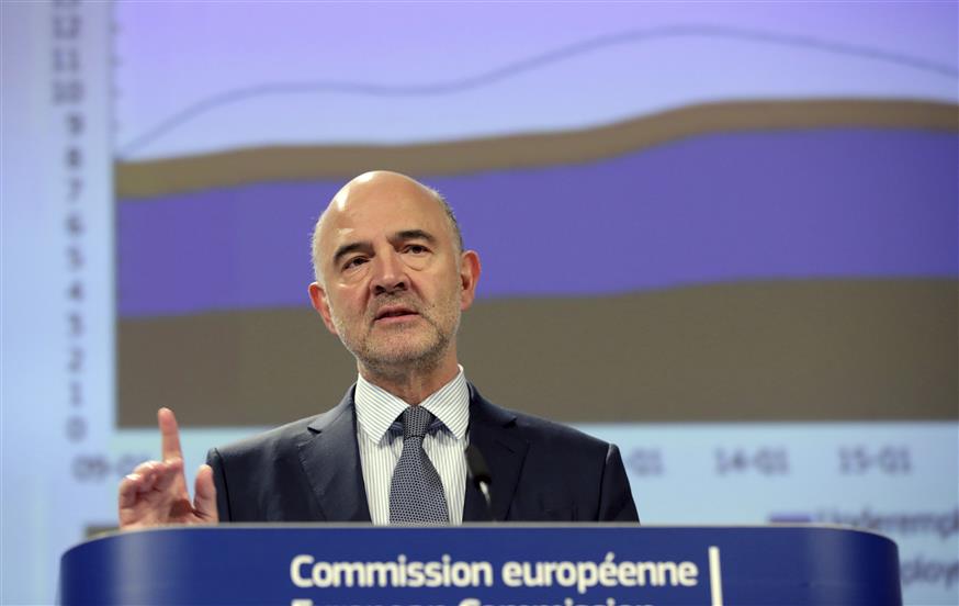 Pierre Moscovici/(AP Photo/Olivier Matthys)