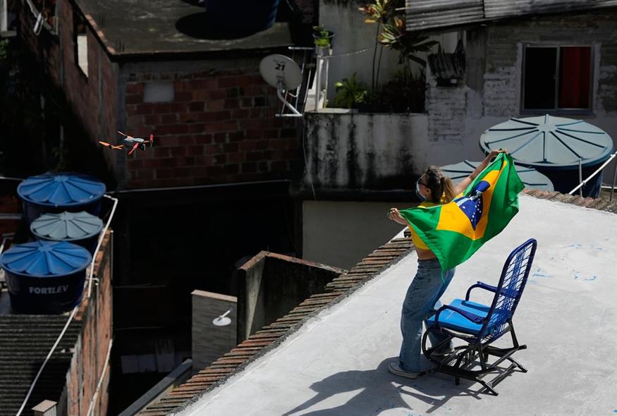 Brazilcore: Η μόδα που έχει βάλει τη Βραζιλία στο παγκόσμιο επίκεντρο - Ρεκόρ τουριστών και viral ταξίδια στο Ρίο (AP Photo/Silvia Izquierdo) Brazilcore: Η μόδα που έχει βάλει τη Βραζιλία στο παγκόσμιο επίκεντρο - Ρεκόρ τουριστών και viral ταξίδια στο Ρίο (AP Photo/Silvia Izquierdo)