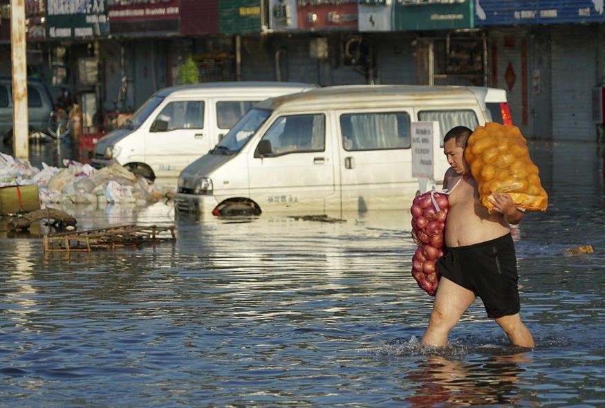 Σφοδρές καταιγίδες προκαλούν πλημμύρες στην Κίνα (φωτογραφία αρχείου / Associated Press)