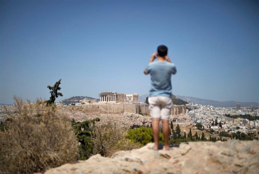 Εικόνες από την καλοκαιρινή Αθήνα/AP Images