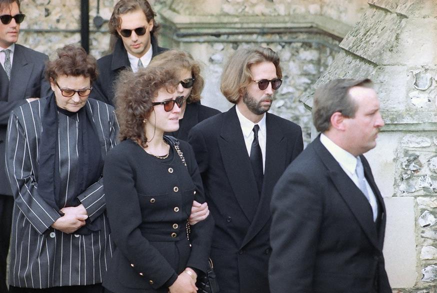 Ο Έρικ Κλάπτον με τη Λόρι Ντελ Σάντο στην κηδεία του παιδιού τους. /copyright Ap Photos