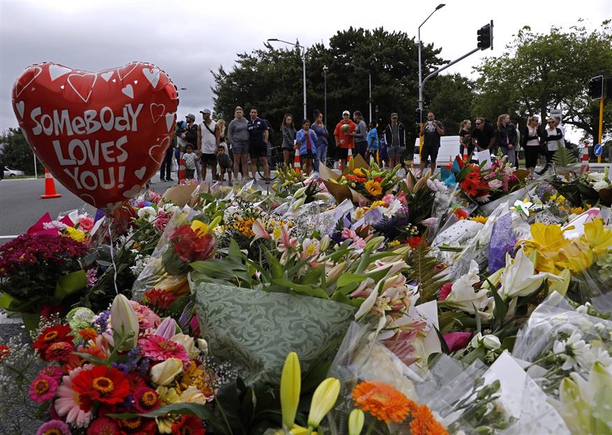 Φόρος τιμής στα θύματα του μακελειού στη Νέα Ζηλανδία (AP Photo/Vincent Yu)