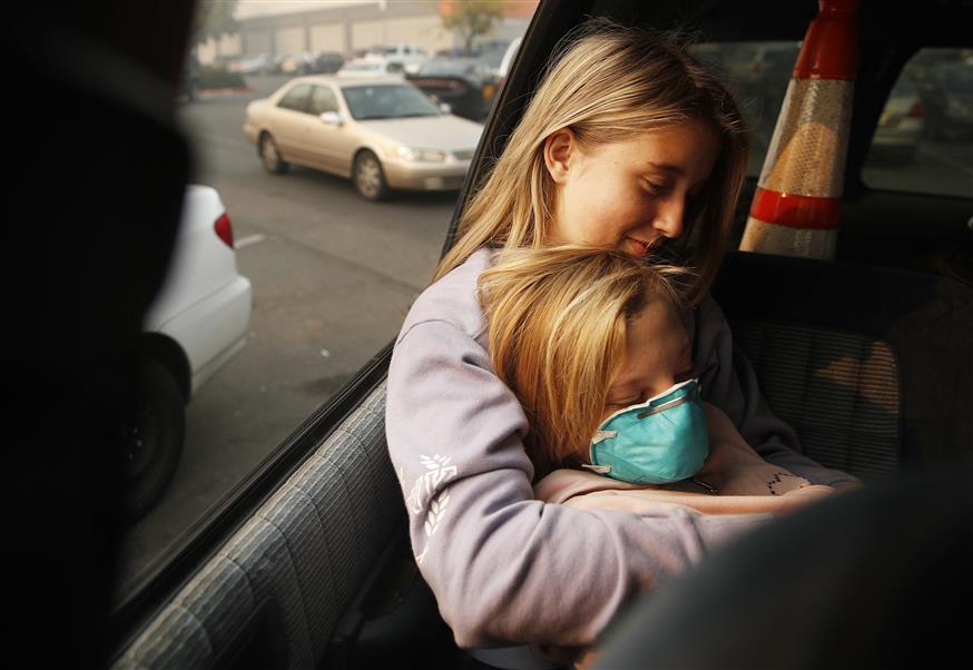 Άλλη μια οικογένεια που ζει μέσα στο αυτοκίνητο (AP Photo/John Locher)