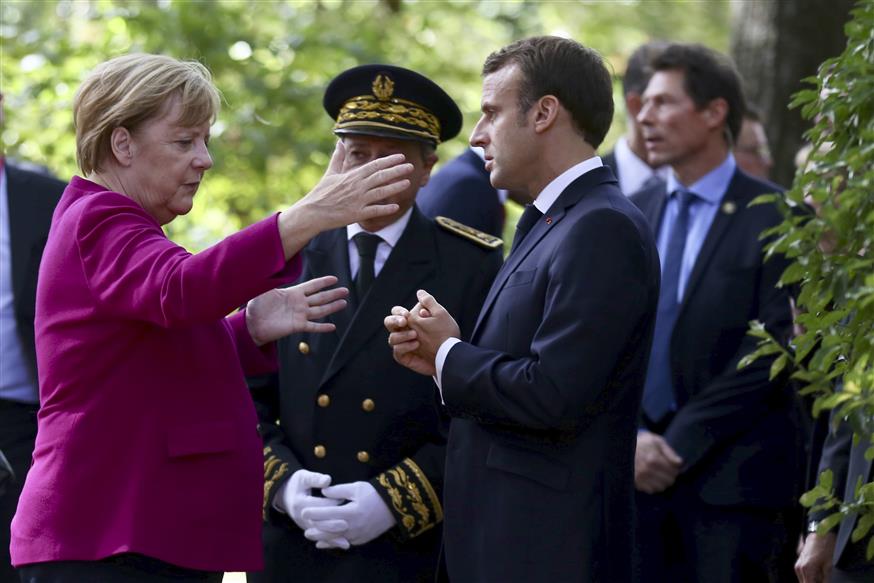 Η Γερμανίδα καγκελάριος με τον Γάλλο πρόεδρο (copyright: Associated Press)