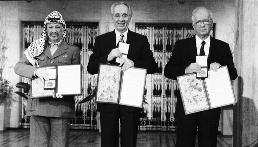 Γιάσερ Αραφάτ, Σιμόν Πέρες και Γιτζάκ Ράμπιν. Από το Νόμπελ Ειρήνης στον θάνατο! /copyright Ap Photos