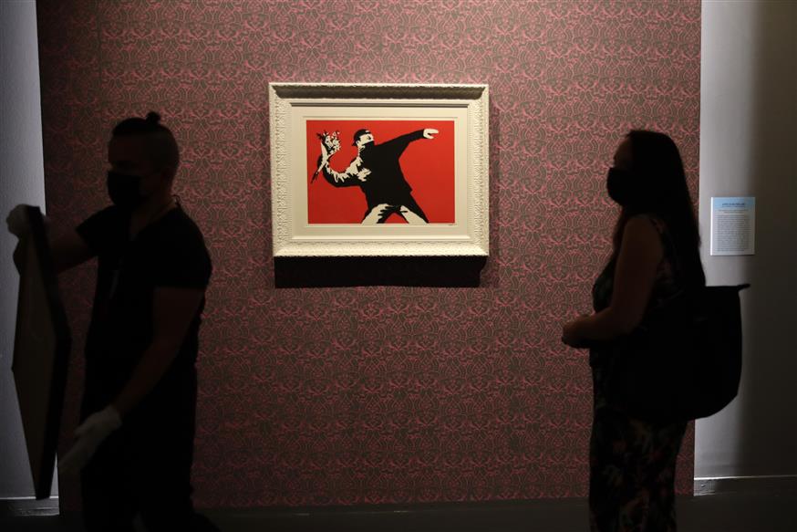 Ο μασκοφόρος του Banksy/Copyright: AP Images