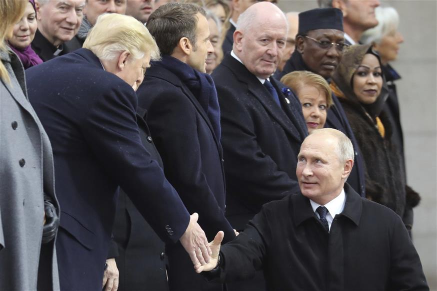 Trump - Putin/(Ludovic Marin/Pool Photo via AP)