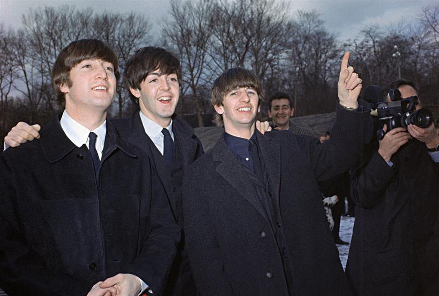 John Lennon, Paul McCartney και Ringo Starr (Copyright: AP Photo)