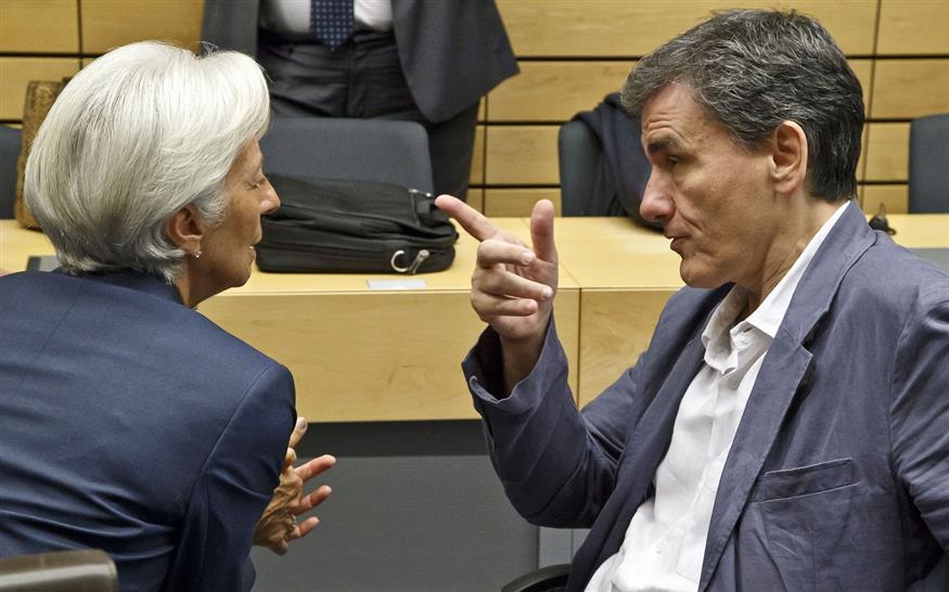 H διεθύντρια του ΔΝΤ με τον Ευκλείδη Τσακαλώτο (AP Photo/Michel Euler)