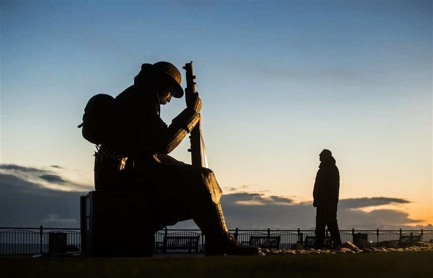 A statue of a First World War soldier/(Danny Lawson/PA via AP)