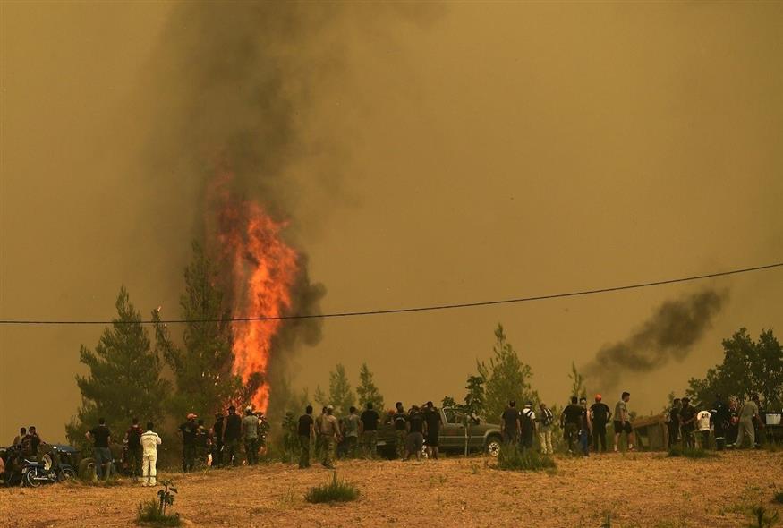 Στιγμιότυπο από τις πυρκαγιές στη Βόρεια Εύβοια το καλοκαίρι του 2021 (Associated Press)