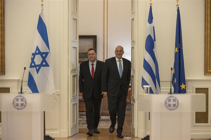 Greek Foreign Minister Nikos Dendias, right, and his Israeli counterpart Israel Katz , arrive for a news conference after their meeting, in Athens, Thursday, Oct. 31, 2019 (AP Photo)