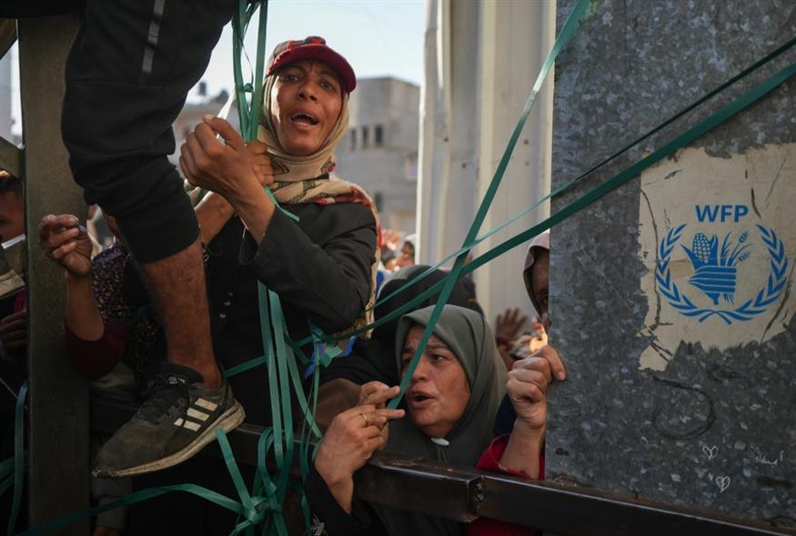 Κάτοικοι στη Γάζα (AP Photo/Abdel Kareem Hana)