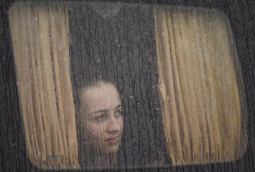 Γυναίκα στην Ουκρανία (AP Photo/Andreea Alexandru)