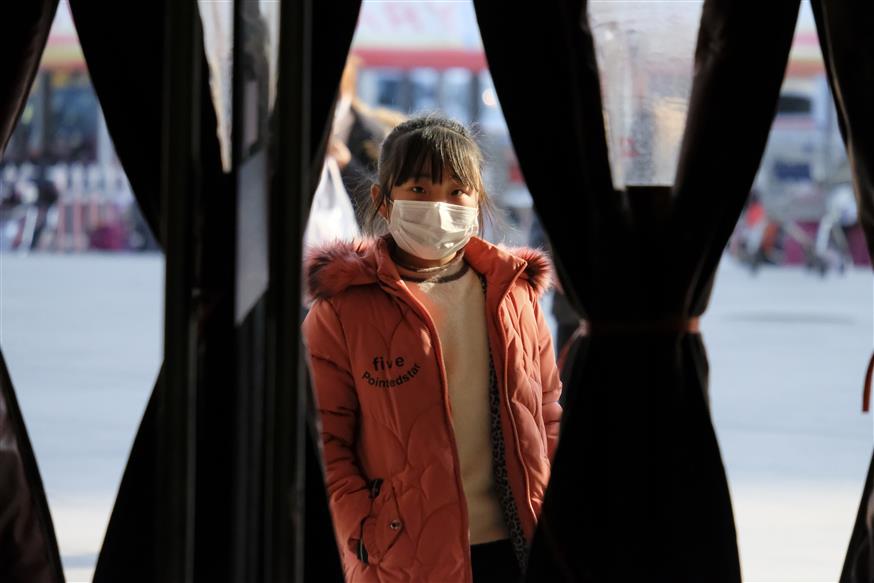 Κοροναϊός στην Κίνα/(AP Photo/Arek Rataj)