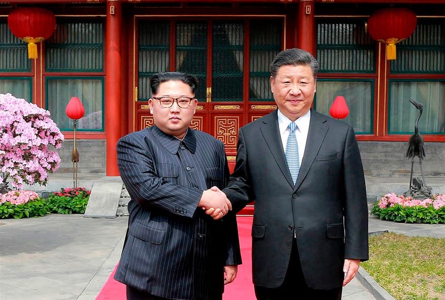 Σι Τζινπίνγκ και Κιμ Γιονγκ Ουν (φωτογραφία αρχείου / Associated Press)