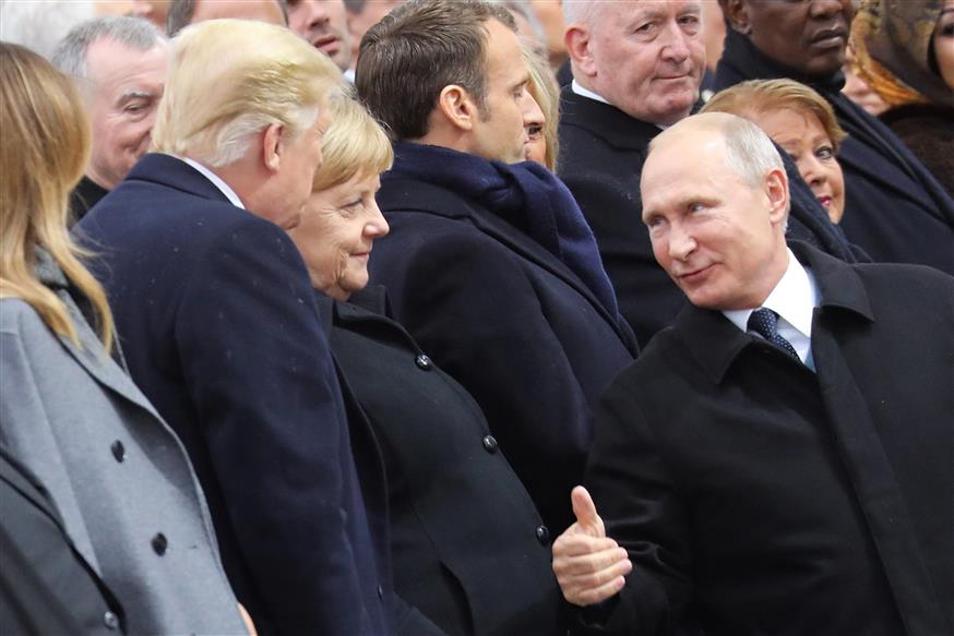 Τραμπ - Μέρκελ - Πούτιν/AP Images
