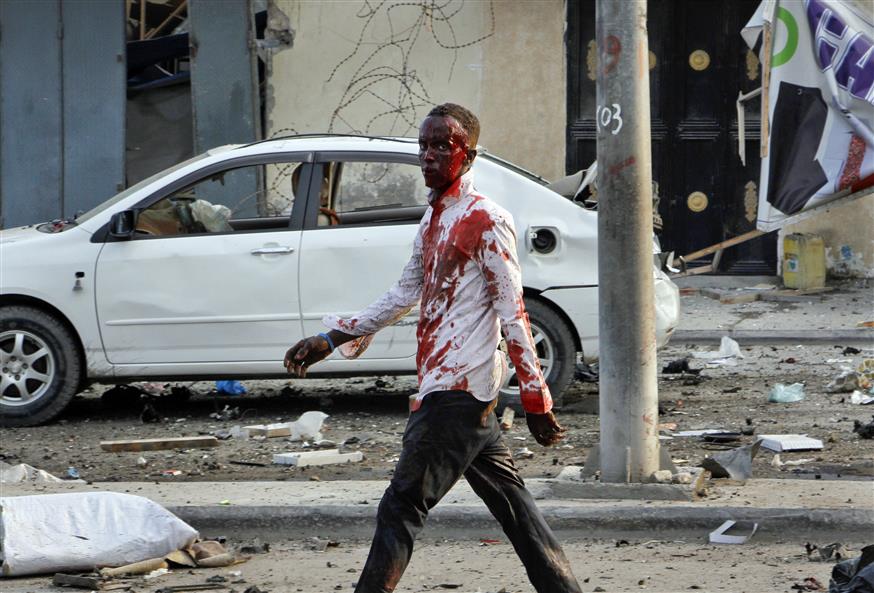 Injured civilian/(AP Photo/Farah Abdi Warsameh)