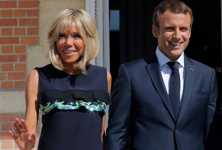 Ο Γάλλος πρόεδρος Εμανουέλ Μακρόν και η σύζυγός του, Μπριζίτ (ΑP)