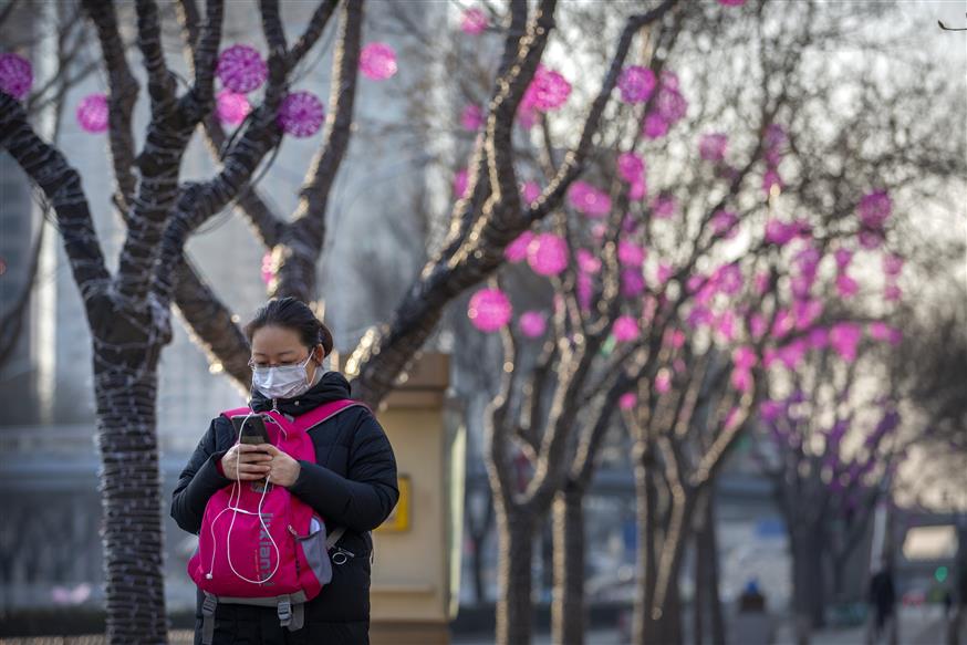 Κοροναϊός στην Κίνα/(AP Photo/Mark Schiefelbein)